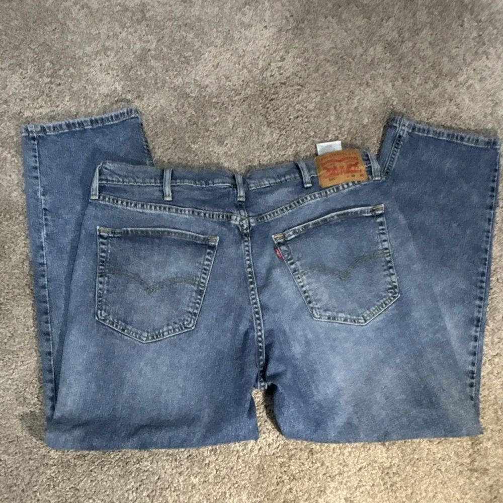 Levi's Men's Blue Denim Jeans Medium Wash Tapered‎ 5-Pocket Logo Cotton